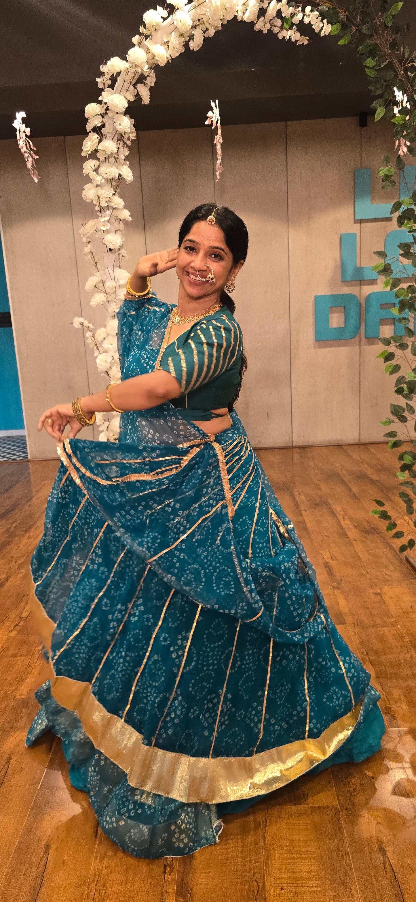 Siddhi Firozi Bandhani lehenga