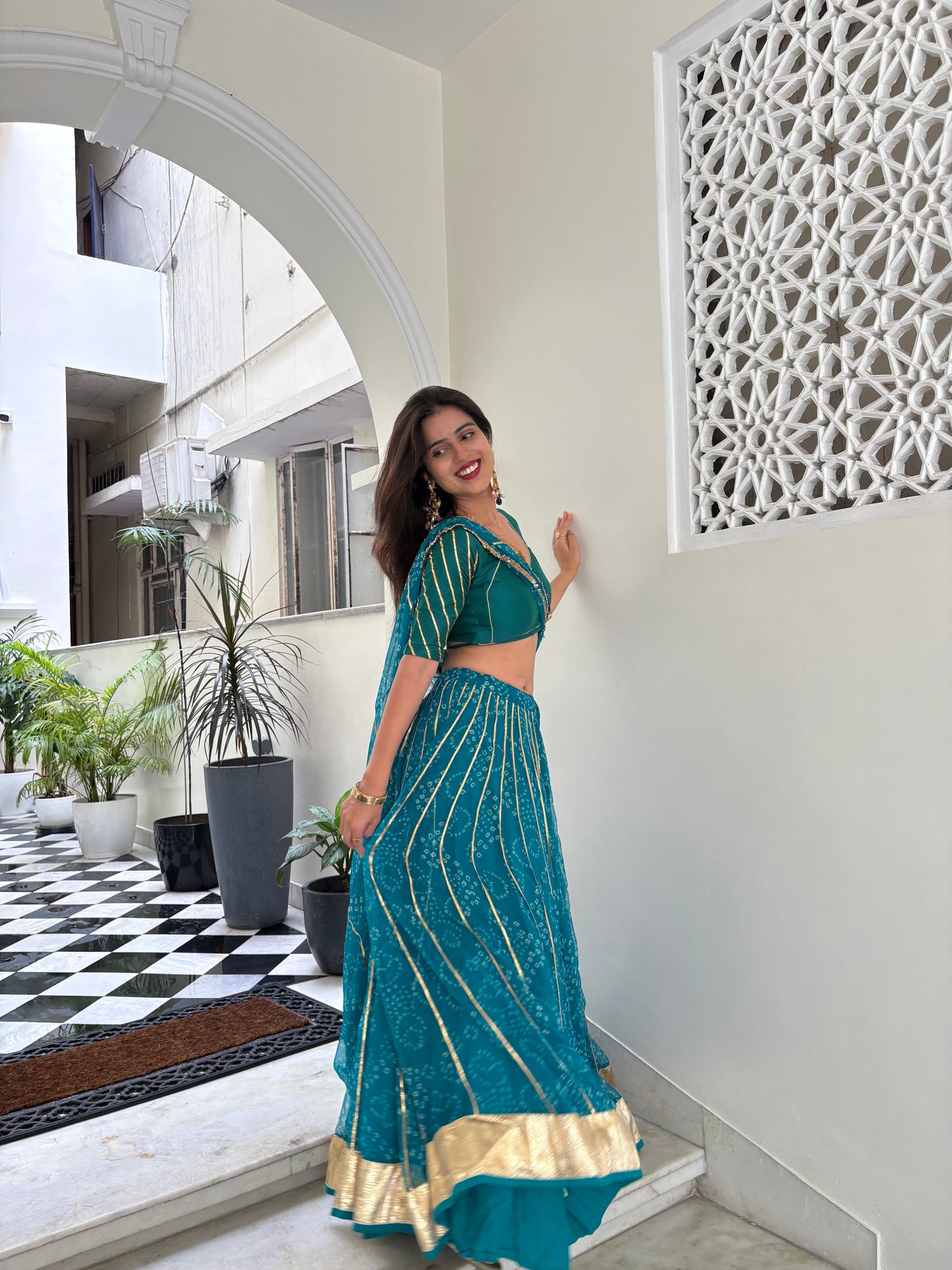 Siddhi Firozi Bandhani lehenga