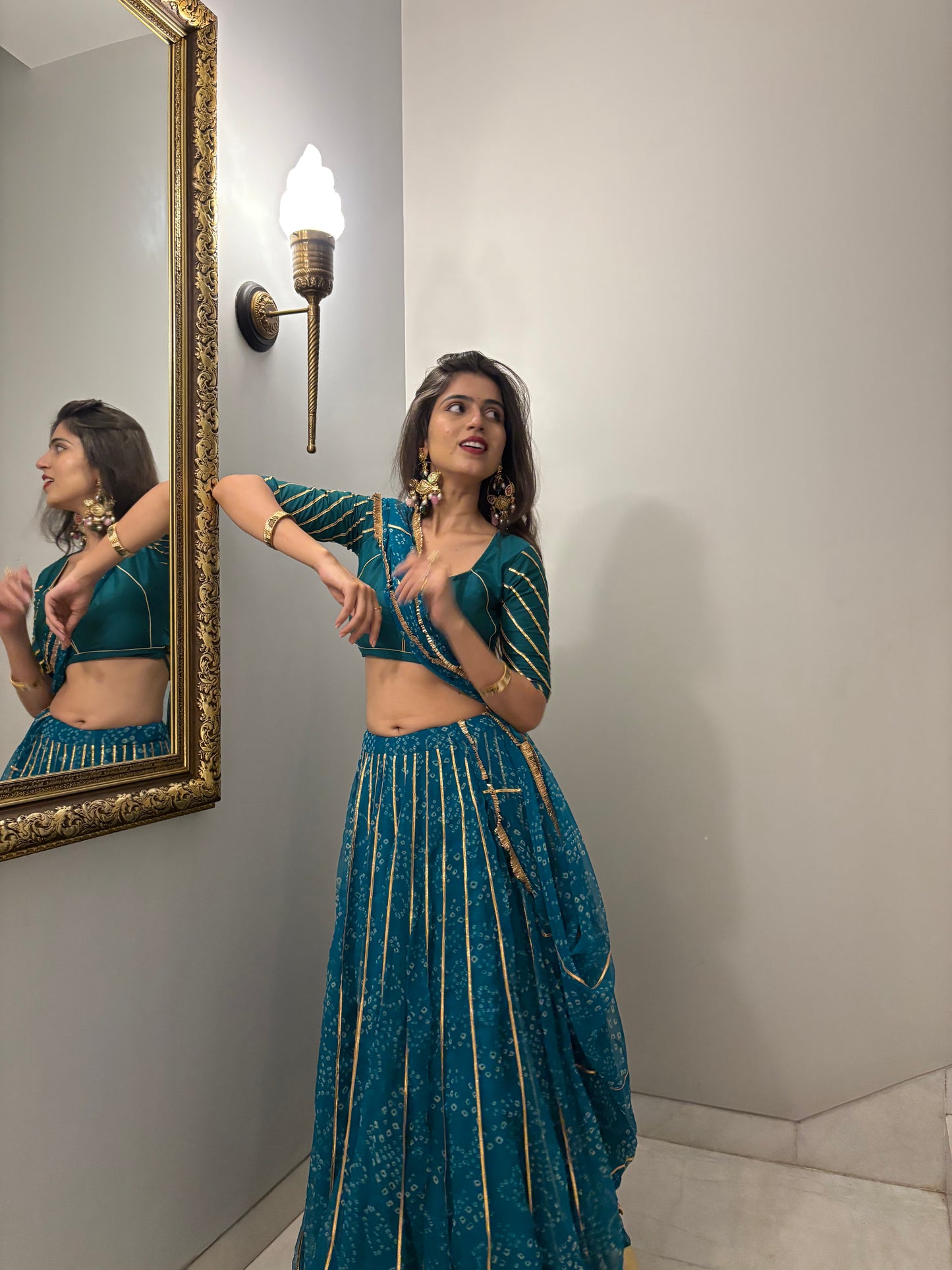 Siddhi Firozi Bandhani lehenga