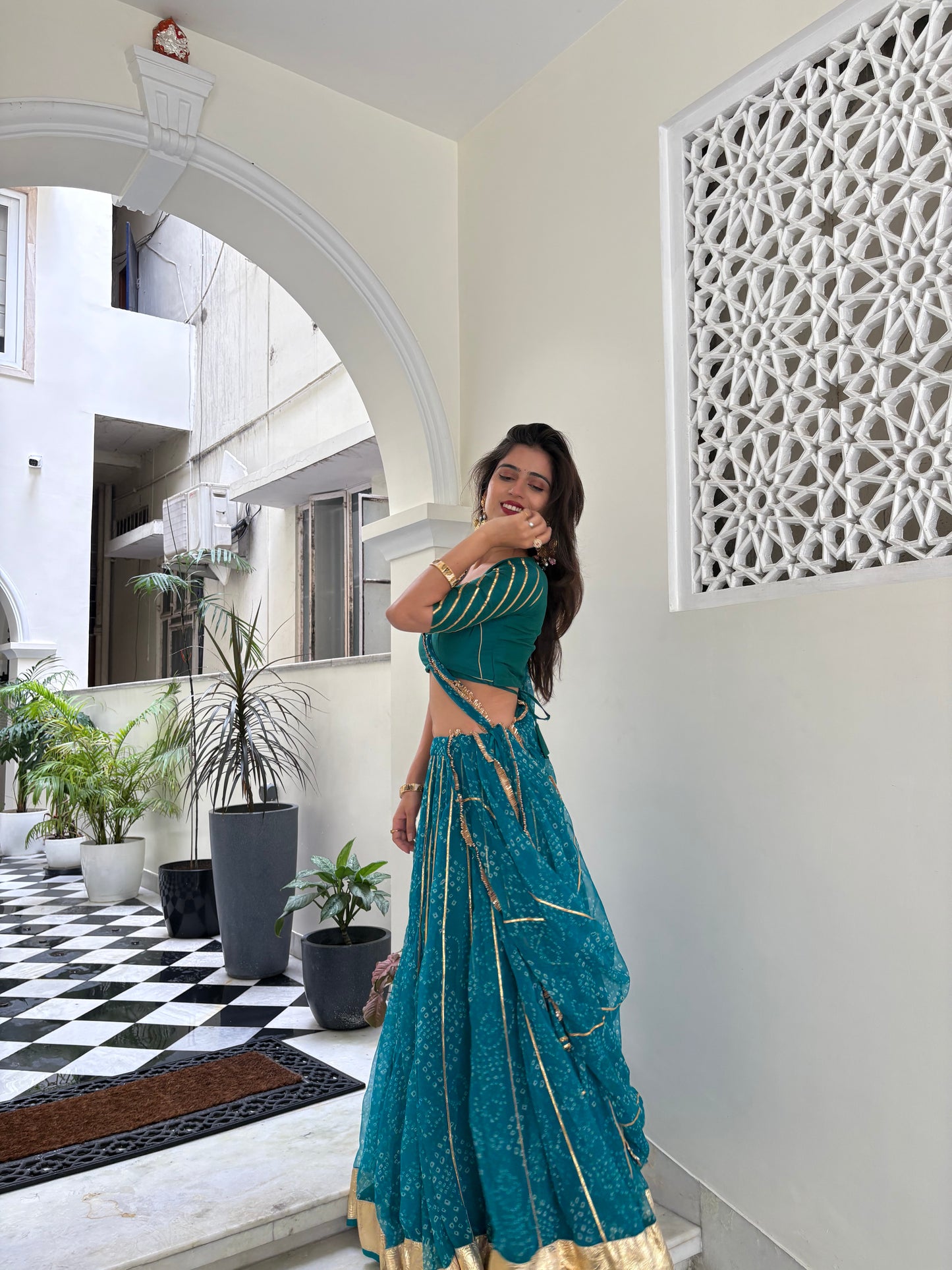 Siddhi Firozi Bandhani lehenga