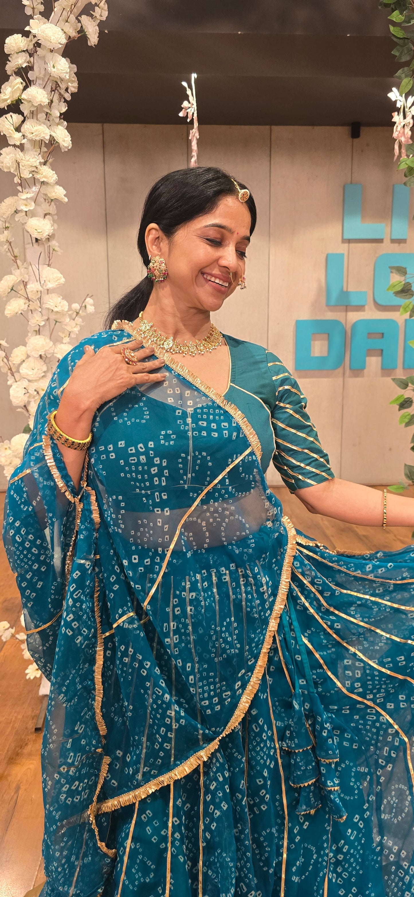 Siddhi Firozi Bandhani lehenga