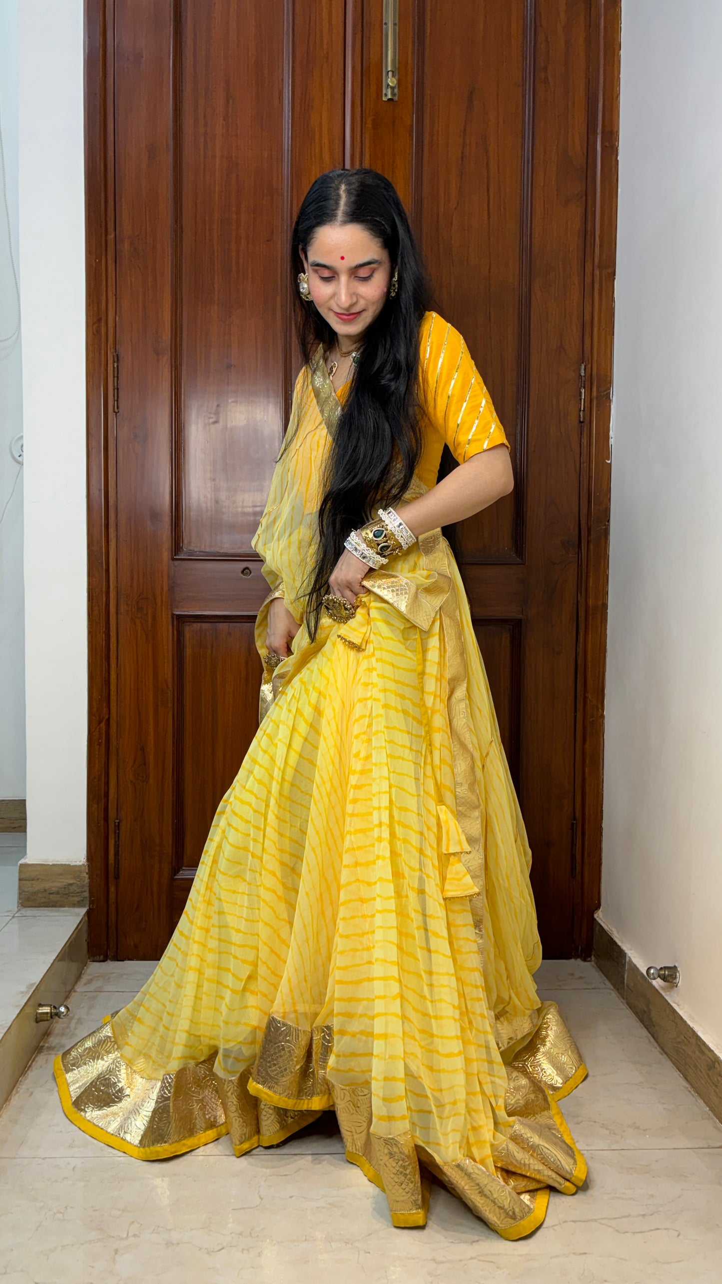 Pavitra Yellow Leheriya Lehenga