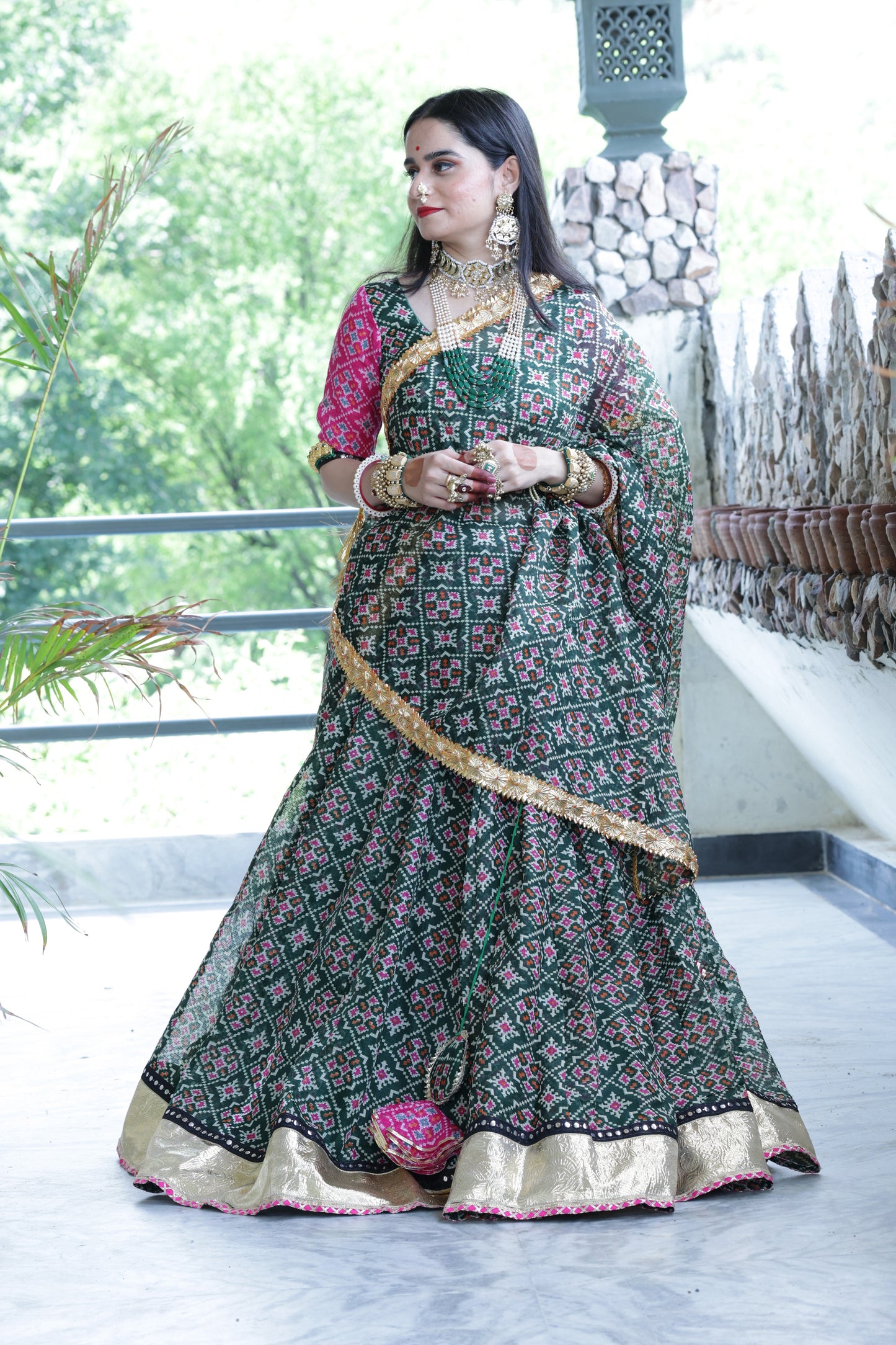 Varshini Green Patola Lehenga