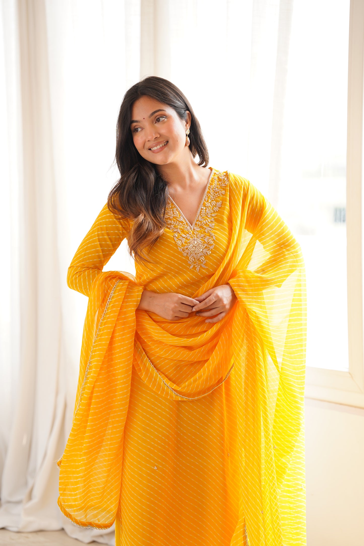 Arti Yellow Handwork Leheriya Suit Set